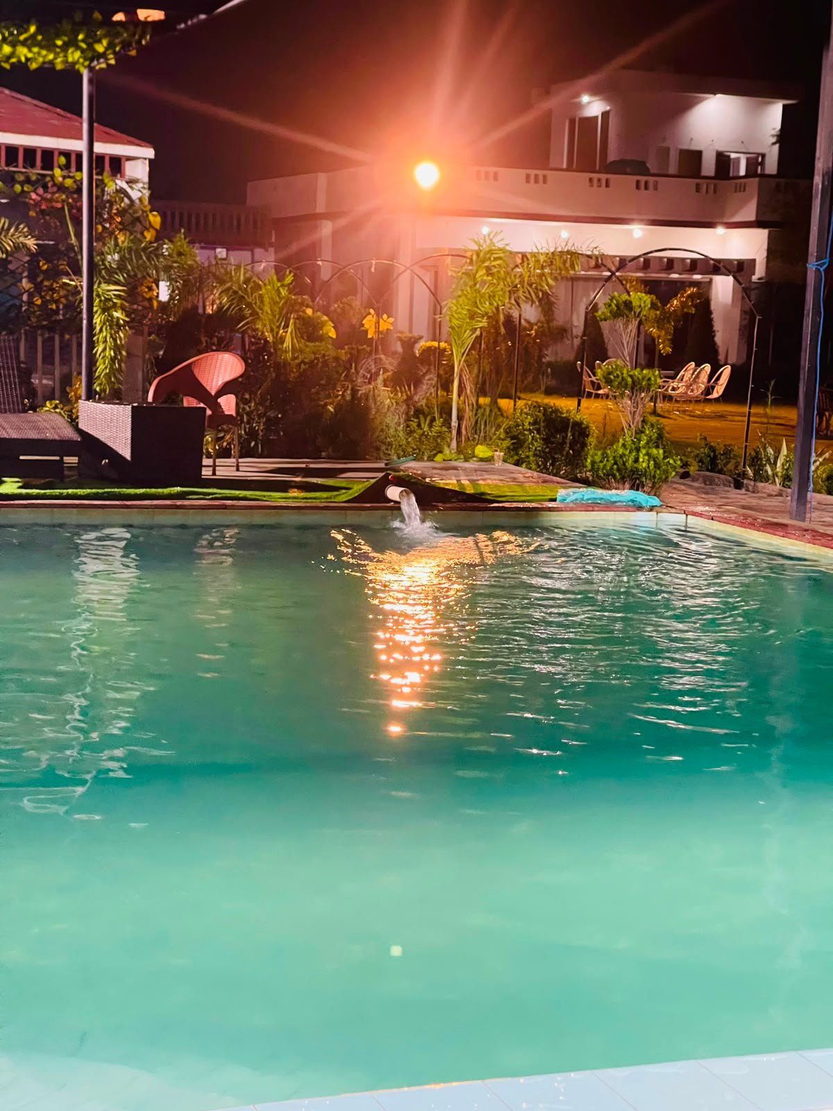 Pool at night with warm lights