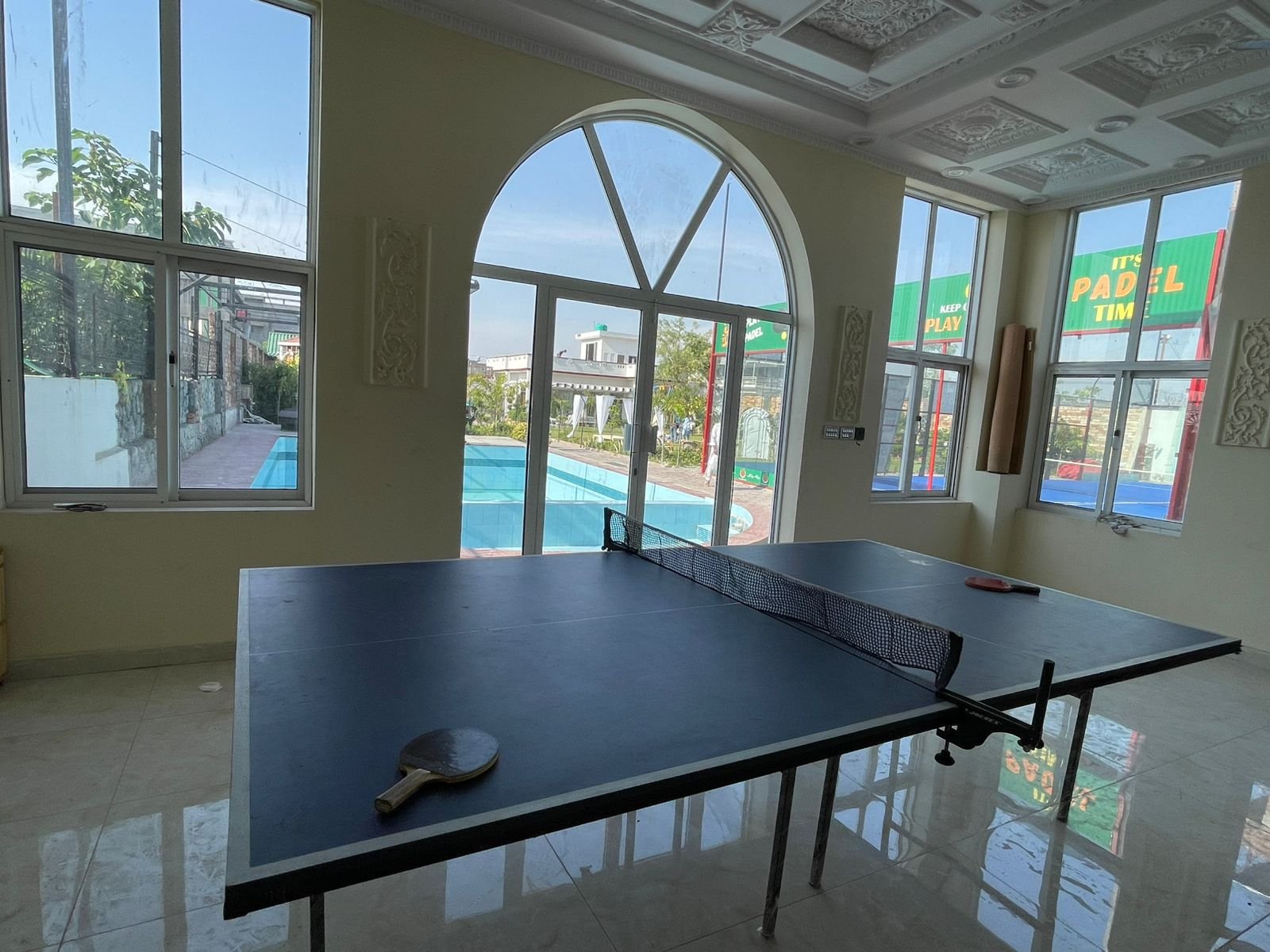 Table tennis room overlooking the pool